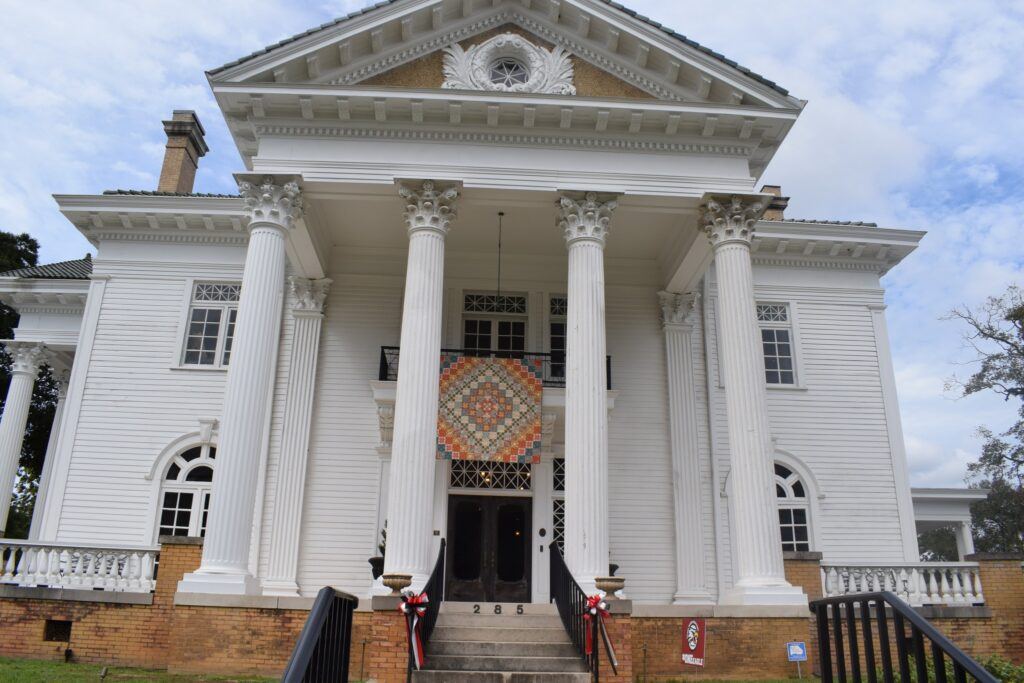 Front view of the historic J.D. Holman House in Ozark, Alabama