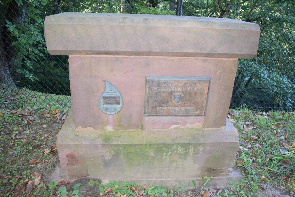 Interpretive sign for the Union Arch Bridge, detailing its construction and role in the Washington Aqueduct.