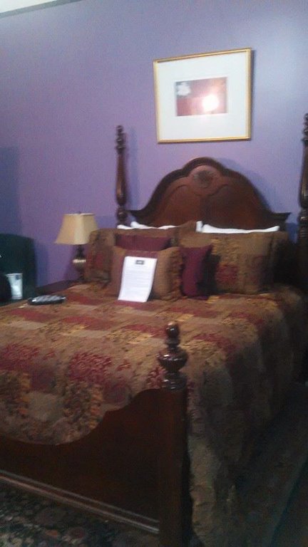 Bed in our room at the Canal Street Inn