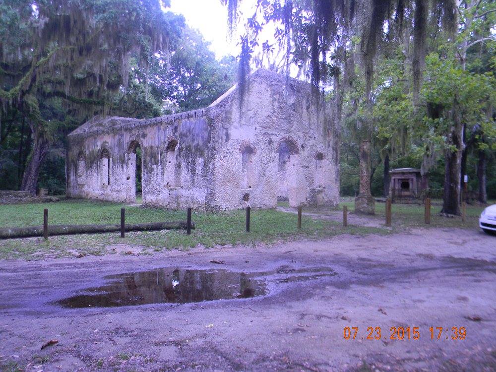 Ruins of the St. Helena Parish Chapel of Ease on St. Helena Island, built in the 1740s from tabby and now standing abandoned beneath moss-covered trees.