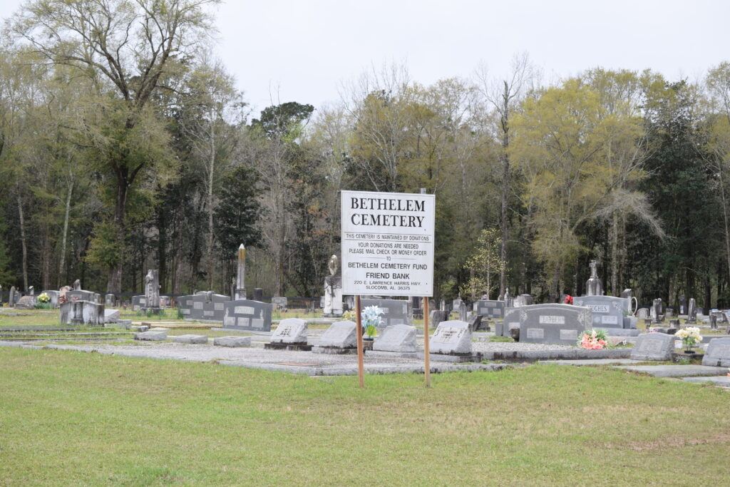 Bethlehem Church Cemetery sign and grounds, marking an old church property with a long-closed sanctuary and maintained burial area.