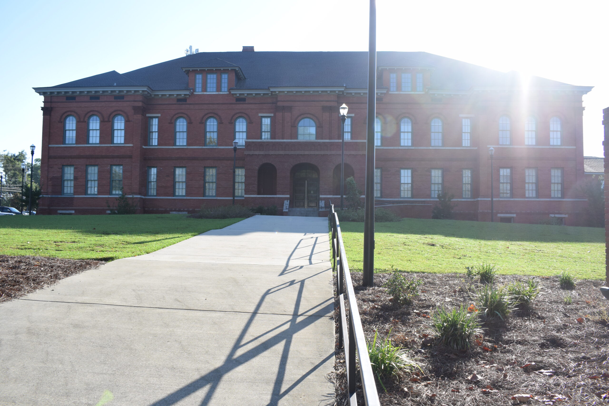 Historic Howell School building in Dothan, Alabama, a restored early-1900s Neoclassical brick school now converted into senior apartments