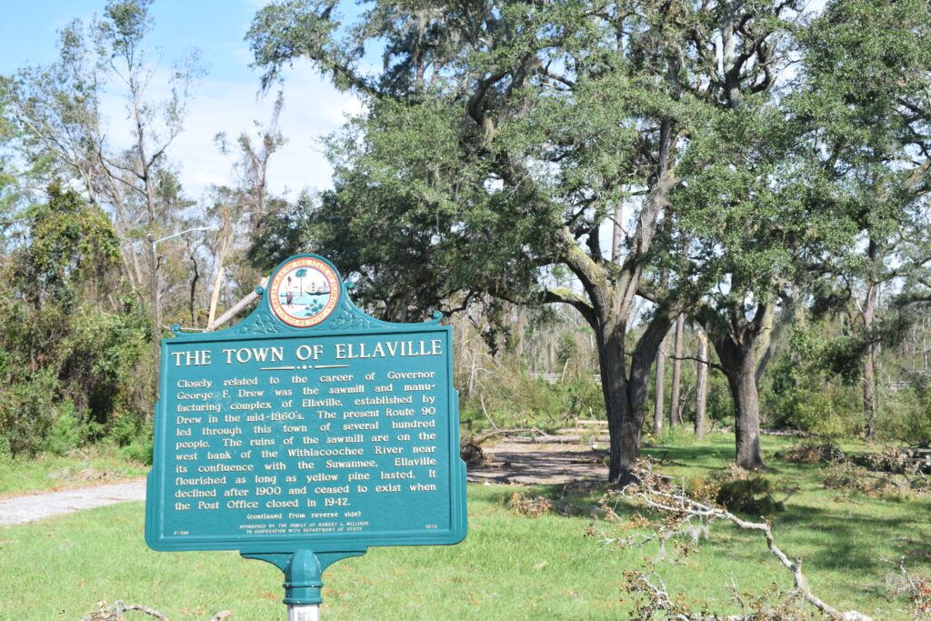Historic marker at Ellaville Ghost Town in North Florida, marking the site of a former lumber boomtown along the Suwannee River.
