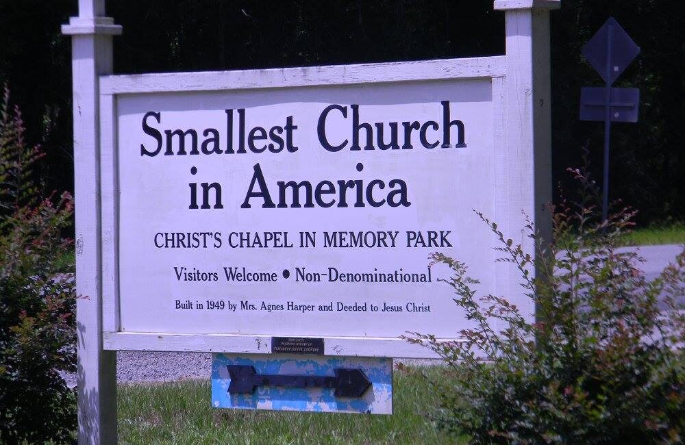 Roadside sign for Christ’s Chapel in South Newport, Georgia reading “Smallest Church in America,” photographed July 2015