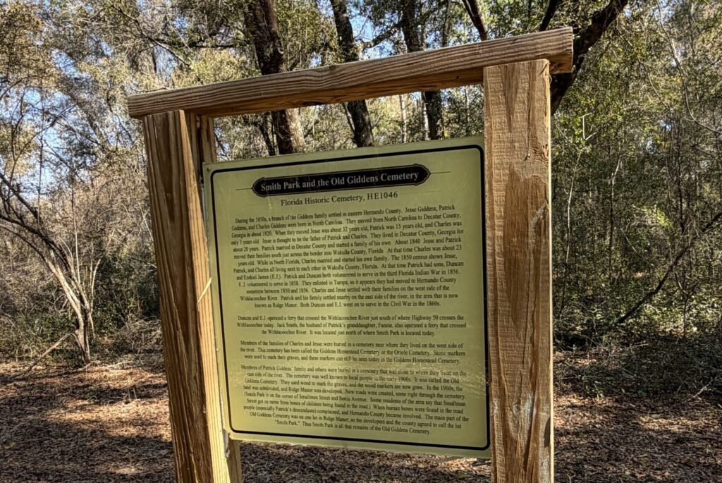 Historical marker at Old Giddens Cemetery in Smith Park, Webster, Florida, detailing the Giddens family history and the cemetery’s origins