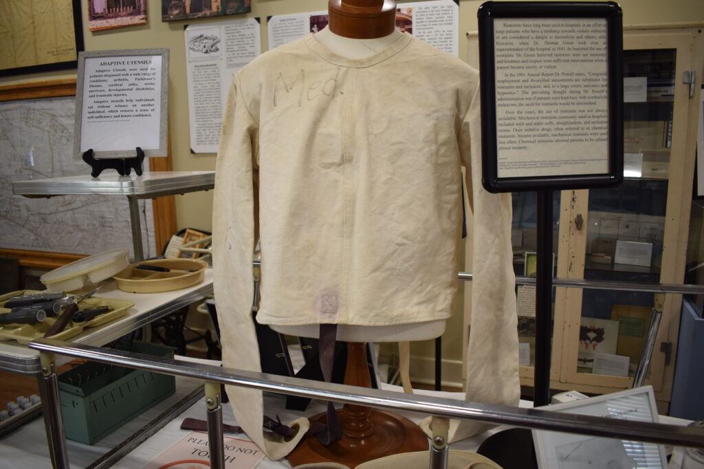 A historic restraint jacket displayed at the Central State Hospital Museum in Milledgeville, Georgia.