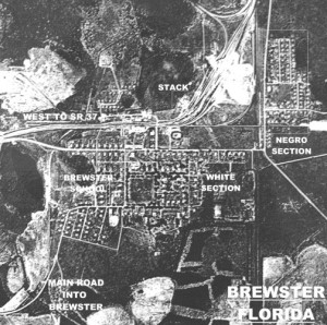 Historic aerial map of Brewster, Florida, labeling separate “White Section” and “Negro Section” residential areas within the phosphate company town.