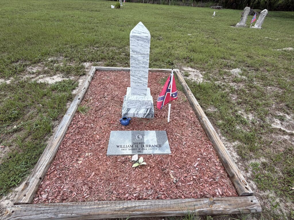 Grave of William Hutto Durrance, the first elected sheriff of Polk County, at Crum-Durrance Cemetery in Florida.