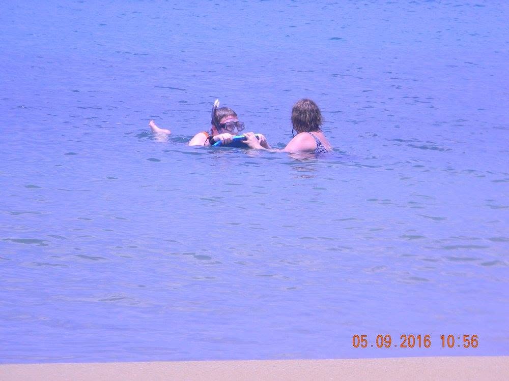 My son practicing with a boogie board in the water at Rincón Beach, Puerto Rico, during our May 2016 visit.