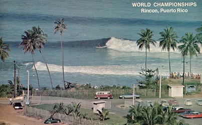 Historic view of surfers and spectators along the coast during the World Surfing Championships in Rincón, Puerto Rico.