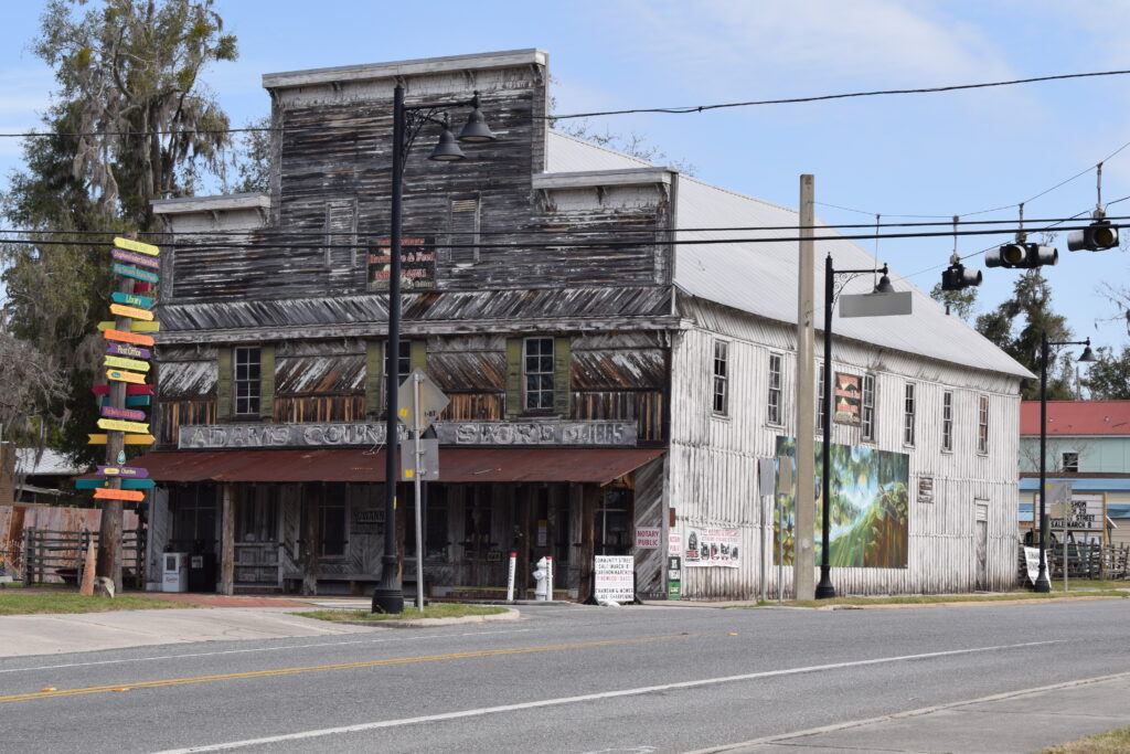 Weathered historic Adams Country Store building in downtown White Springs, Florida.