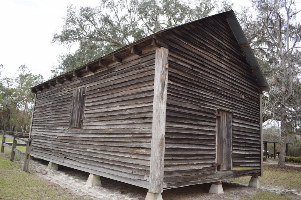Weathered wooden historic building surviving at Falling Creek Falls near Lake City, Florida.