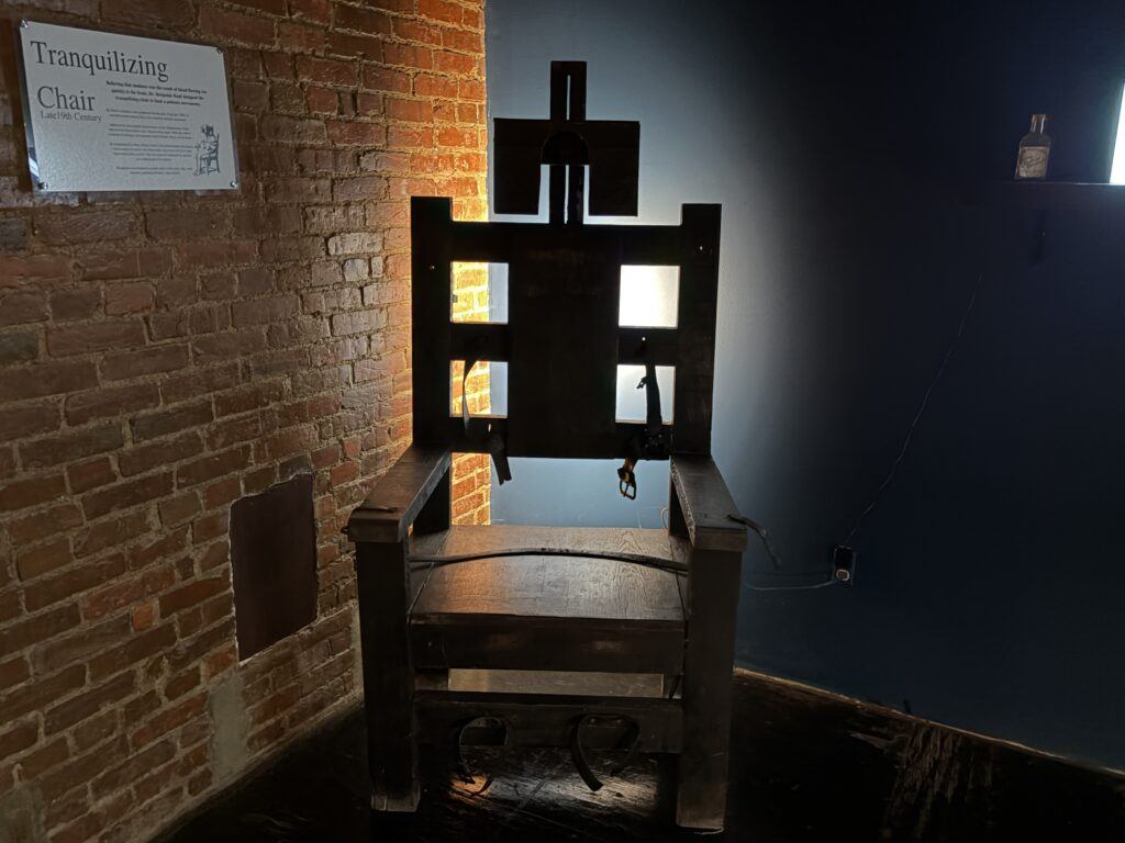 Historic tranquilizing chair exhibit at Trans-Allegheny Lunatic Asylum in Weston, West Virginia