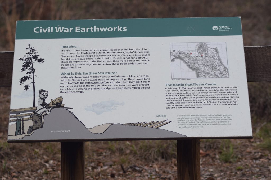 Florida State Parks interpretive sign titled "Civil War Earthworks," featuring historical illustrations, a Florida battlefield map, and information about Confederate defenses near the Suwannee River.