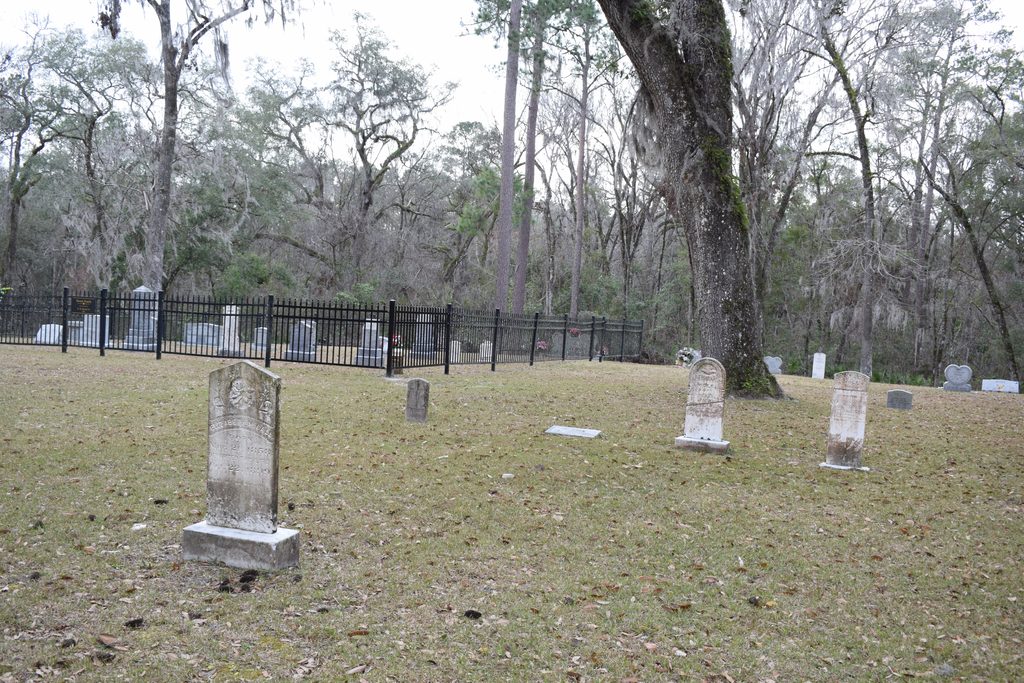Historic and modern gravestones in Falling Creek Methodist Cemetery near Lake City, Florida