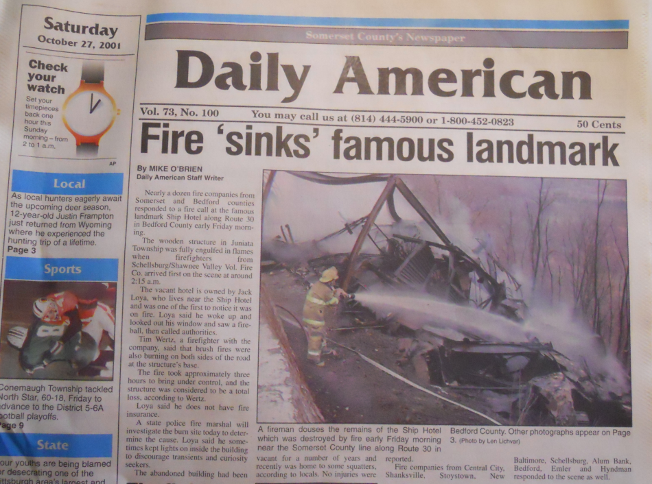 October 27, 2001, Daily American newspaper front page featuring the headline “Fire ‘sinks’ famous landmark” and a photograph of a firefighter extinguishing the remains of Pennsylvania’s Grand View Ship Hotel.