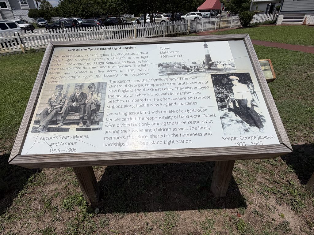 Interpretive sign at Tybee Island Light Station in Georgia featuring historic photographs of lighthouse keepers Swan, Minges, Armour, and George Jackson, with information about daily life and responsibilities at the station.