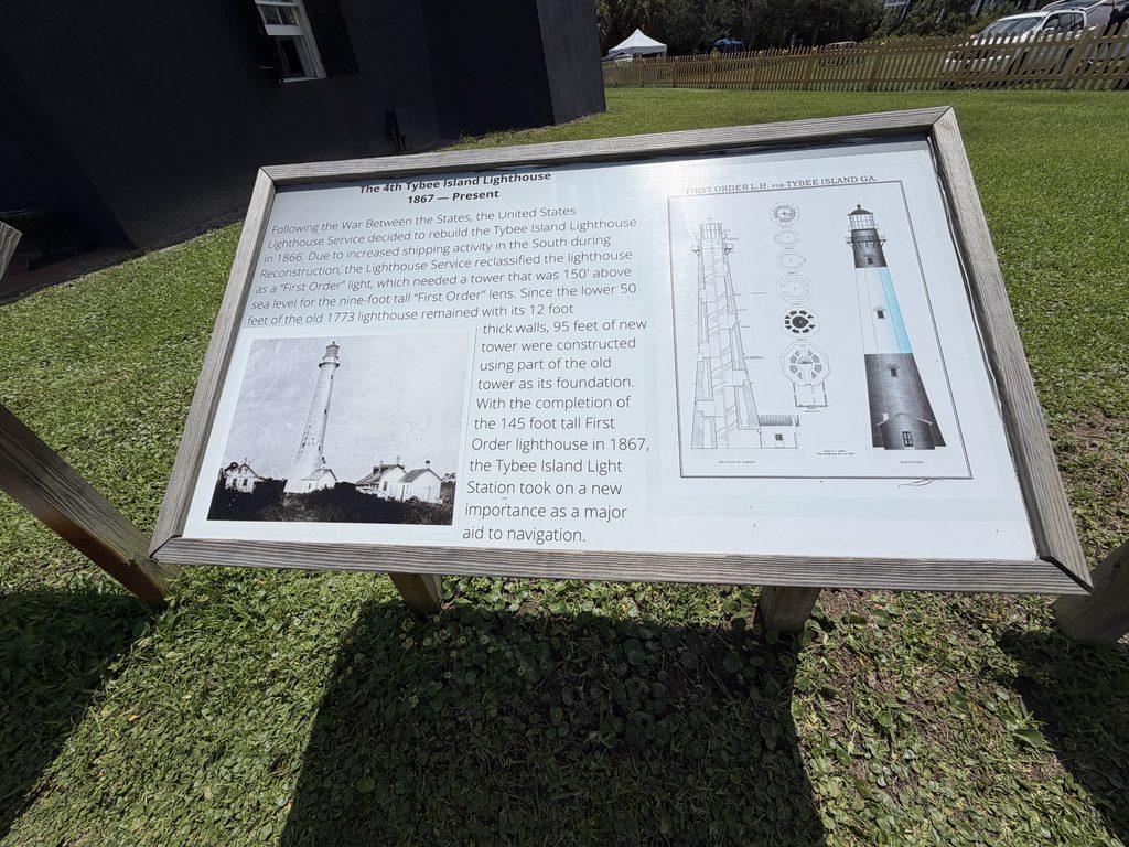 Interpretive sign at Tybee Island Light Station in Georgia showing a historic photograph, architectural drawings, and details of the lighthouse's reconstruction in 1867 following Civil War damage.
