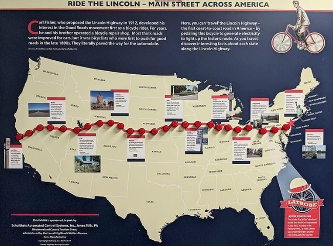 Illustrated map of the United States showing the historic Lincoln Highway route from New York to California, with red markers tracing the cross-country highway.